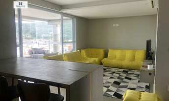 Imagem 2: Apartamento 2 dormitórios sendo 2 suítes com sacada sala-suíte gourmet vista mar, ar condi