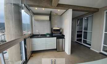 Imagem 7: Apartamento alto padrão com sacada gourmet e vista parcial do mar, lazer completo em lado