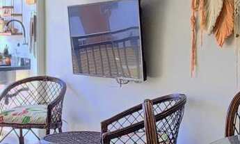 Imagem 5: Apartamento com acesso a sacada, 2 dormitórios climatizados sendo 1 suíte, na praia das AS