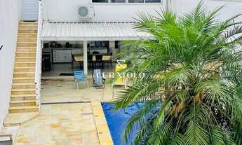 Imagem 2: Viva com conforto e espaço: Conheça sua nova casa de alto padrão, de 5 Quartos, com 3 Vag