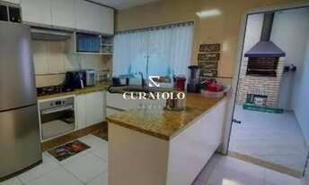 Imagem 2: Casa sobrado à venda no bairro Chácara Mafalda, com 3 quartos, 2 vagas e quintal com churr