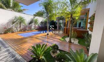 Imagem 2: Viva com conforto e espaço: Conheça sua nova casa de altíssimo padrão, de 4 Suítes, com 10