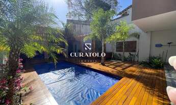 Imagem 4: Viva com conforto e espaço: Conheça sua nova casa de altíssimo padrão, de 4 Suítes, com 10