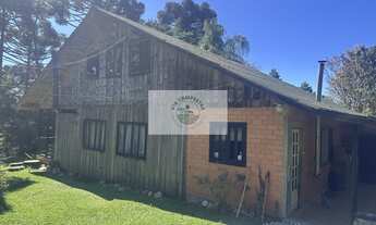 Imagem 2: Sítio com 32.000 m2, escriturado, com uma residência e chalé, possui lago, próximo a divis