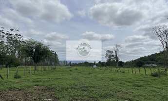 Imagem 3: Terreno com 9.292 m2, de frente para o asfalto, Estrada Timbé, com 2 casas, galpão, rancho