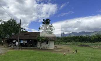 Imagem 2: Sítio com 22.000 m², com duas casas, riacho cristalino, escriturada, frente para rua pavim