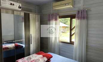 Imagem 3: Sítio com 22.000 m², com duas casas, riacho cristalino, escriturada, frente para rua pavim