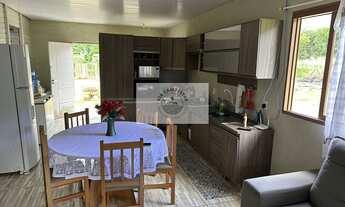 Imagem 7: Sítio com 22.000 m², com duas casas, riacho cristalino, escriturada, frente para rua pavim