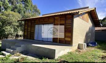 Imagem 1: Sítio com 2.500 m² e uma residência nova com uma suíte e mais 1 dormitório, analisa permut