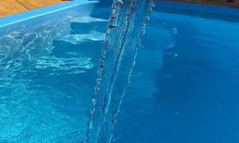 Imagem 5: Casa de Praia em condomínio fechado, contando com 02 dormitórios e piscina adulto e infant