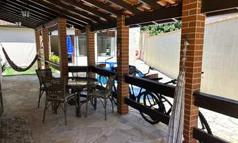 Imagem 3: Casa com piscina e área gourmet à venda no Guaratuba Residencial – Bertioga/SP