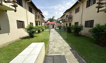 Imagem: Casa térrea em villagio pé na areia, com