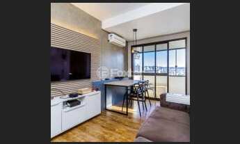 Imagem 1: Apartamento 1 quarto com living para dois ambientes sacada com churrasqueira