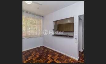 Imagem 2: Apartamento 1 dormitorio com area de serviço e cozinha semi mobiliada