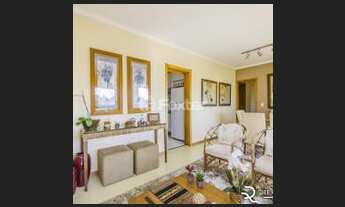 Imagem 2: Apartamento 3 quartos sendo 1 suite com living para dois ambientes e sacada