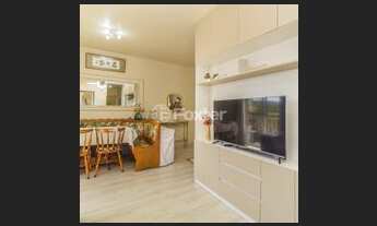 Imagem 3: Apartamento 3 quartos sendo 1 suite Living para dois ambientes com sacada e cozinha ameri