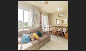 Imagem 2: Apartamento 3 quartos sendo 1 suite Living para dois ambientes com sacada e cozinha ameri