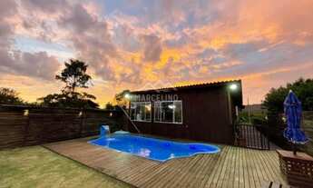 Imagem: Casa com terreno grande e área de lazer