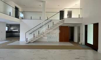 Imagem 6: Casa à venda com 340 m², 4 suítes, sala de estar, cozinha, hidromassagem e 2 vagas garagem