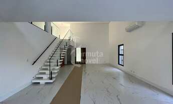 Imagem 7: Casa à venda com 340 m², 4 suítes, sala de estar, cozinha, hidromassagem e 2 vagas garagem