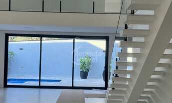 Imagem 3: Casa à venda com 340 m², 4 suítes, sala de estar, cozinha, hidromassagem e 2 vagas garagem