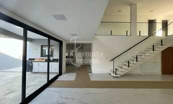 Imagem 4: Casa à venda com 340 m², 4 suítes, sala de estar, cozinha, hidromassagem e 2 vagas garagem