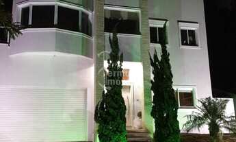 Imagem 2: Casa com 450m², 5 suítes, elevador, piscina aquecida e pomar no Alphasítio