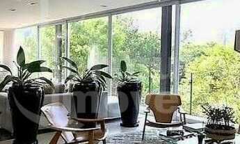 Imagem 6: Casa com 890m², 4 suítes, sala de TV e projeto sustentável no Melville