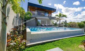 Imagem: Casa de luxo em condomínio beira lago em