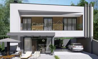 Imagem 2: CASA COM 3 DORMITÓRIOS SENDO 1 SUÍTE E 2 DEMI-SUÍTES