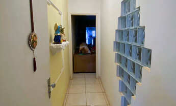 Imagem 6: Casa com piscina e lago com carpas