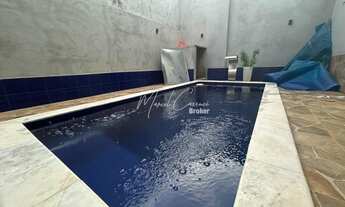 Imagem 6: Casa à venda com 2 suítes sendo 1 com closet, varanda gourmet e piscina