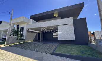 Imagem 2: Belíssima casa à venda com 3 suítes sendo uma com closet, conceito integrado e piscina no