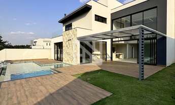 Imagem 2: Sobrado em Condomínio com 4 suítes, Piscina incrível com vista para mata