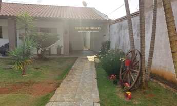 Imagem 3: Casa com Jardim e Área Arborizada