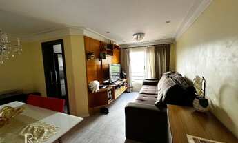 Imagem 2: Apartamento com 2 dormitórios sendo uma suíte, 70m² de area util e uma vaga de garagem cob