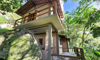 Imagem: Chalé na montanha com acabamento rustico