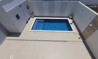 Imagem 7: Seu Refúgio à Beira-Mar: Sobrado de Luxo com Piscina, Automação e 5 Vagas no Cibratel 1