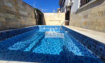 Imagem 2: Oásis Urbano no Embaré: Sobrado Exclusivo com Piscina e Conforto Absoluto, 3 dormitórios