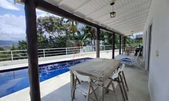 Imagem 3: Casa com 4 dormitórios sendo 2 suítes e com vista para o mar