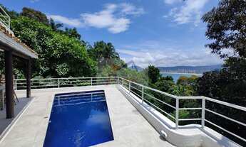 Imagem 6: Casa com 4 dormitórios sendo 2 suítes e com vista para o mar