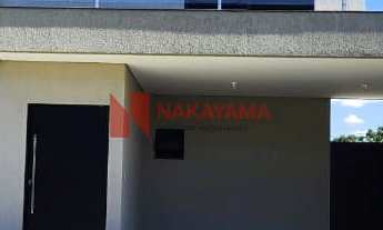 Imagem: Casa com 3 suítes, sala com pé direito