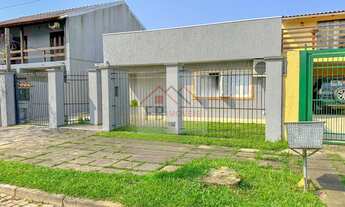 Imagem: Casa térrea com três dormitórios com