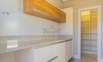 Imagem 7: Sofisticada casa no condomínio Alphaville Lombardia com planejados