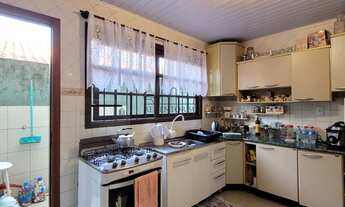 Imagem 5: Casa PadrãoCasa com 4 dormitorios, 2 suites e um terreo