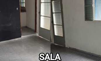 Imagem 3: Casa simples em terreno amplo