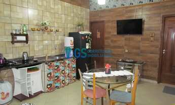 Imagem 2: Ampla casa com 5 quartos, sendo 2 suítes e área de lazer com hidromassagem localizada a 30