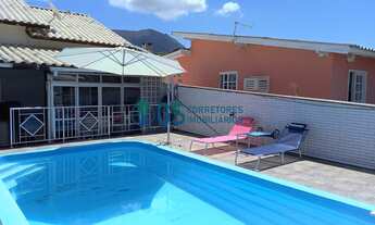 Imagem 4: Ampla casa de 198m² de área privativa com 03 quartos, sendo 01 suíte com piscina e garagem