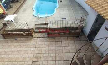 Imagem: Casa Duplex residencial com piscina e garagem