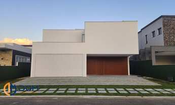 Imagem 2: Casa à venda com arquitetura e acabamentos de alto padrão com 4 suítes em condomínio fecha